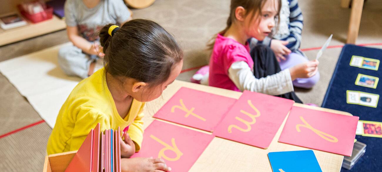 Primary student working in classroom