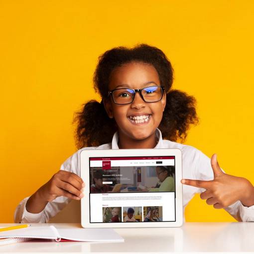 Student holding an iPad