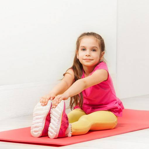 Elementary student stretching